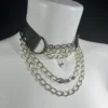 Ana handmade leather necklace with curved chain detailing