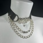Ana handmade leather necklace with curved chain detailing