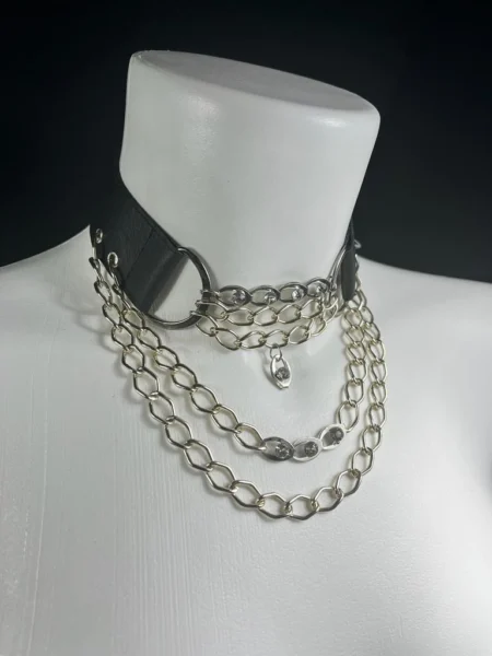 Ana handmade leather necklace with curved chain detailing