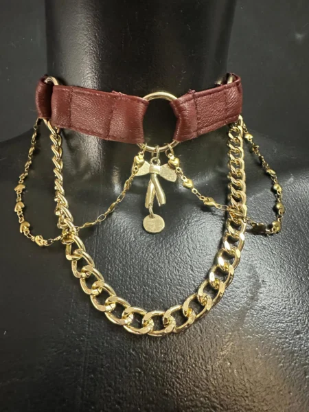 Berlin West burgundy leather choker with gold chains, ring pendant and bow charm – view 2