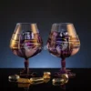 Azure Whisper Amethyst Edition set of two hand painted cognac glasses in violet and gold