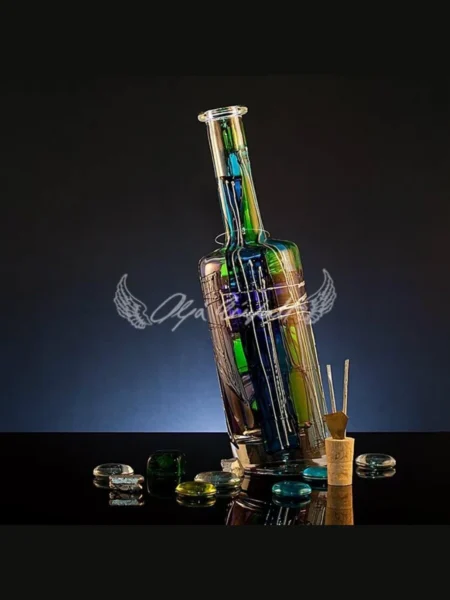 Emerald Edition handmade glass bottle in deep shifting green tones
