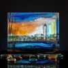 Lighthouse Sunset glass cube with hand painted seascape in warm gold and deep blue