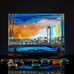 Lighthouse Sunset glass cube with hand painted seascape in warm gold and deep blue