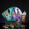 Luminara Flux giant glass fish statue with hand painted luminous colors and golden flow lines