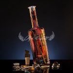Ember Edition hand painted decorative glass bottle with warm glowing tones
