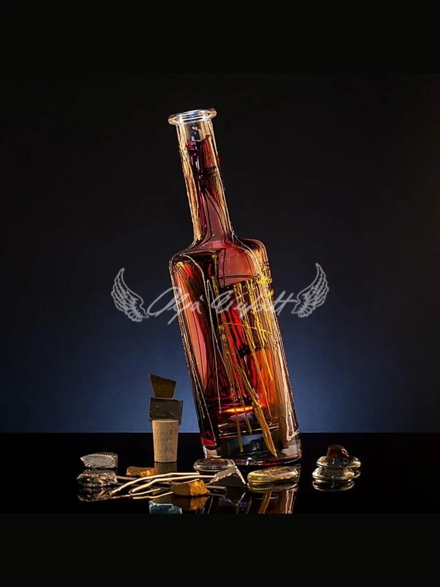 Ember Edition hand painted decorative glass bottle with warm glowing tones
