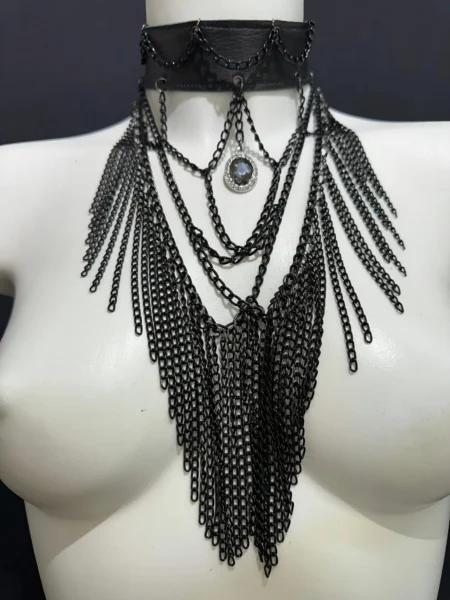 Vampirica Black statement necklace with cascading golden chains and central pendant