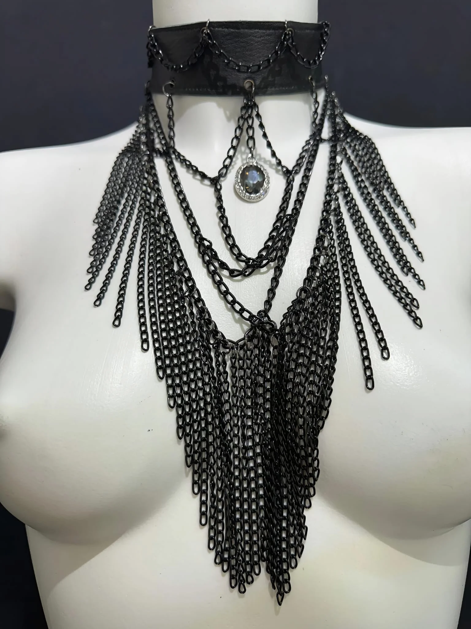 Vampirica Black statement necklace with cascading golden chains and central pendant