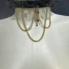 Renaissance Shadow black tulle choker with gold chains and skull charm