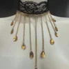 Lacrima Royale Gold Aurora choker with golden chains, crystal teardrops and black lace