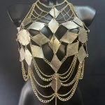 Farfalla gold leather chain top with butterfly-inspired panels and cascading gold chains
