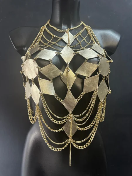Farfalla gold leather chain top with butterfly-inspired panels and cascading gold chains