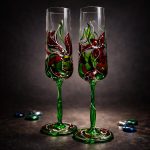 Verdant Kiss set of two hand painted champagne glasses in ruby red and vivid green