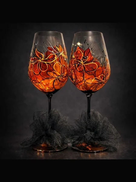 Ember Nocturne set of two hand painted wine glasses in amber with black lines and gold accents