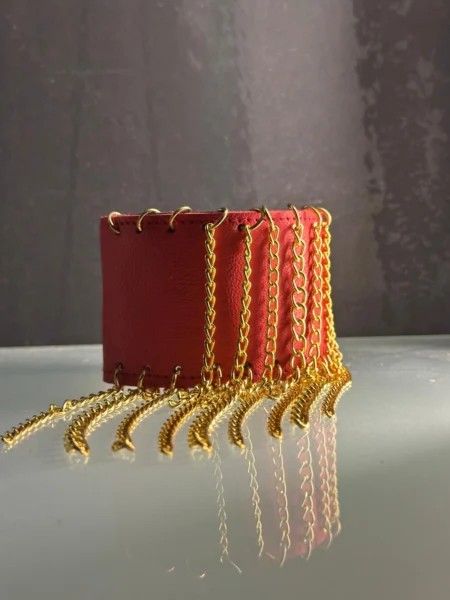 Red leather Chihuahua bracelet with hand-laced detail and gold chains