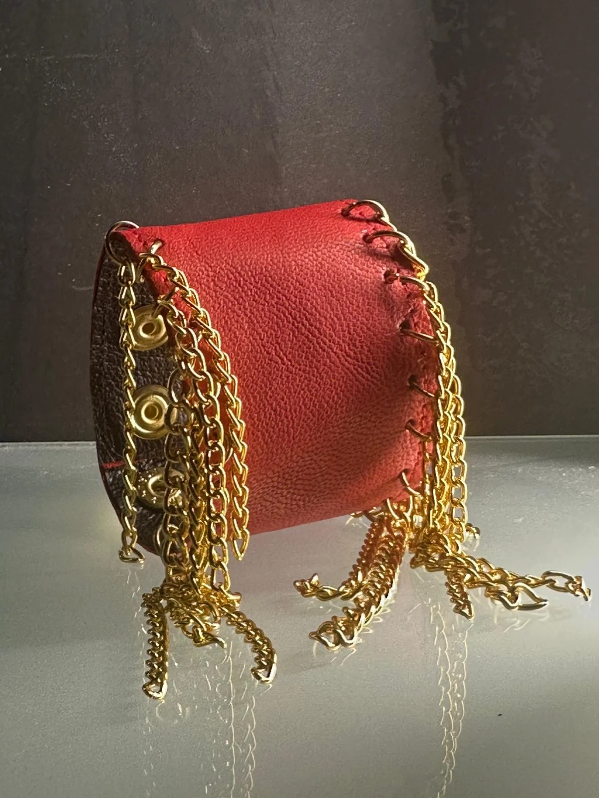 Red leather Chihuahua bracelet with hand-laced detail and gold chains – view 3