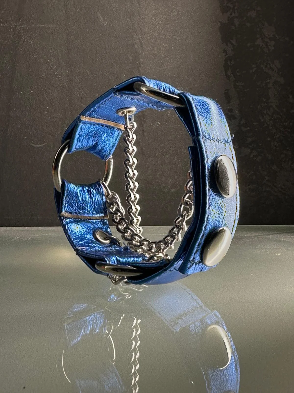 Electric sapphire blue leather cuff bracelet with dark silver hardware and chains – view 3