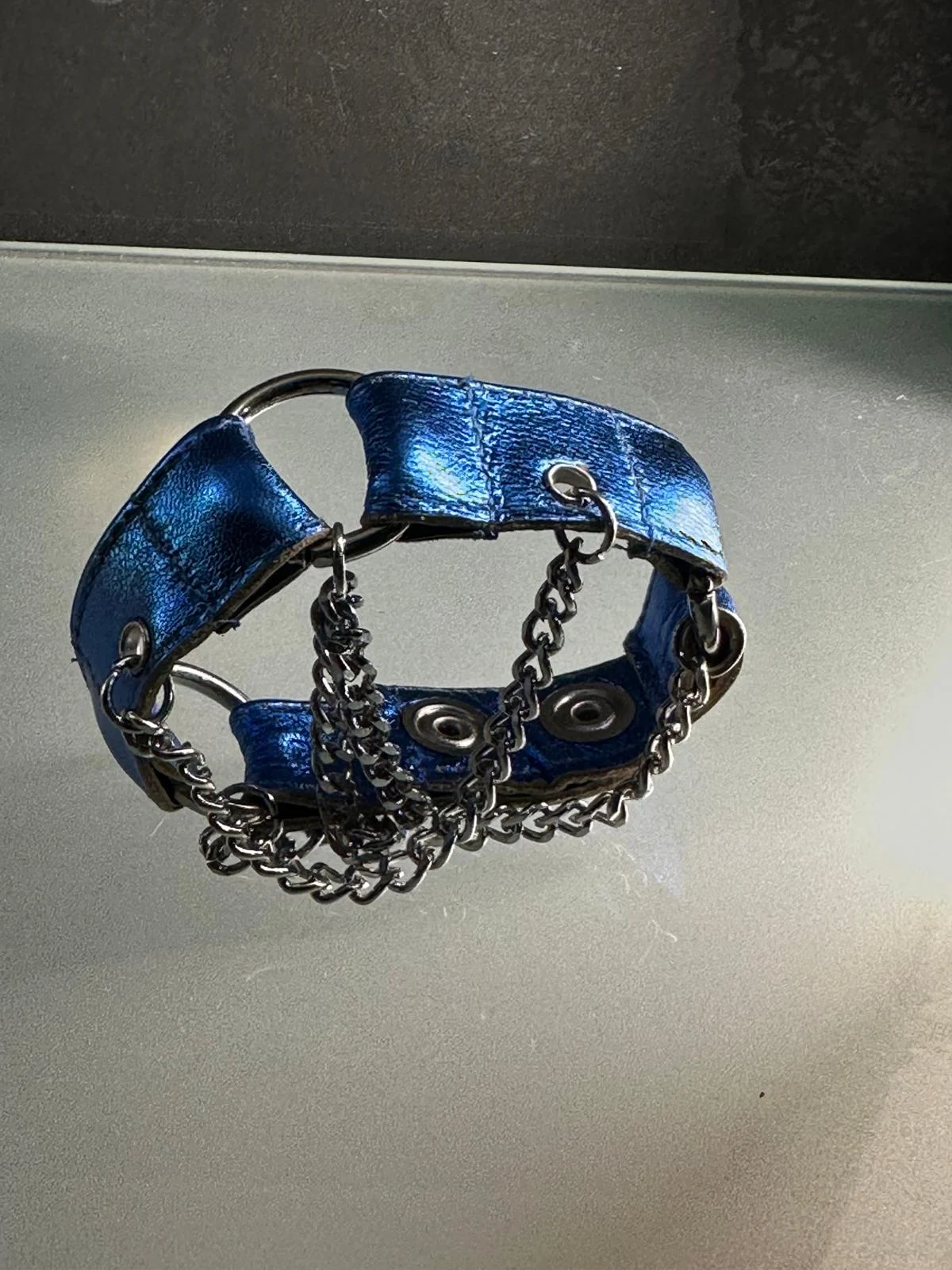 Electric sapphire blue leather cuff bracelet with dark silver hardware and chains – view 2