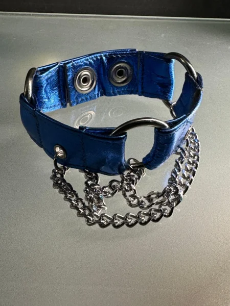 Electric sapphire blue leather cuff bracelet with dark silver hardware and chains