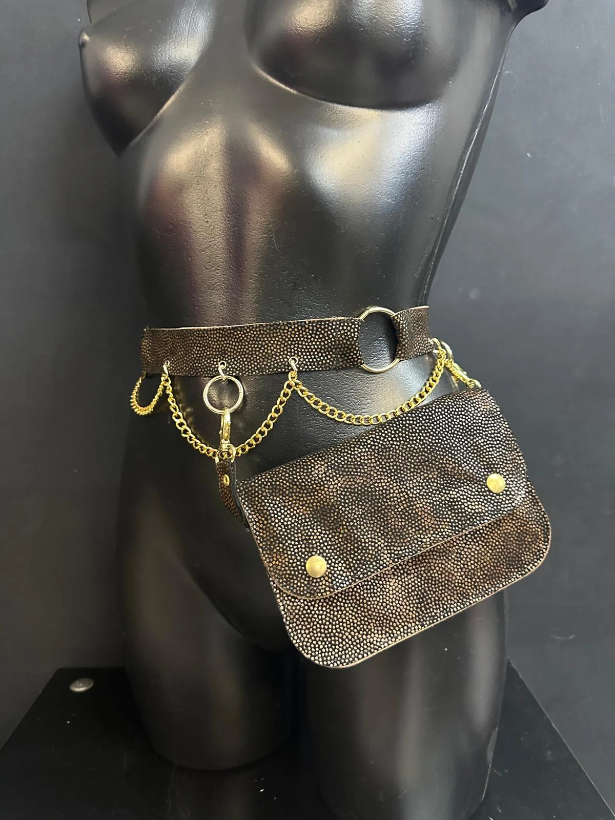Espresso brown textured leather belt bag with gold chains and hardware