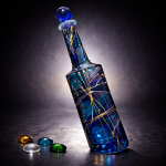 Incline Edition tilted hand painted glass bottle in luminous blue with golden lines